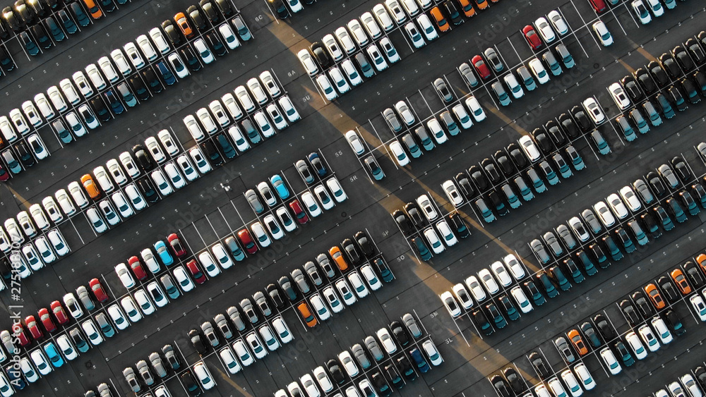 Aerial view of the parked new cars at the automotive plant Aerial view of the parked new cars at the automotive plant