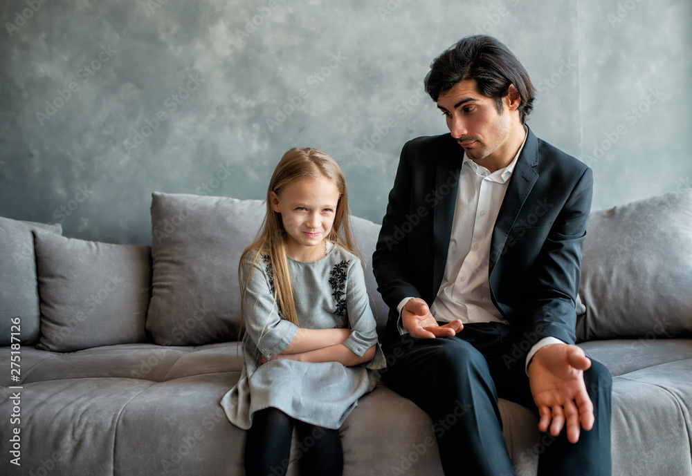 Father and daughter both annoyed and unhappy Father and daughter both annoyed and unhappy