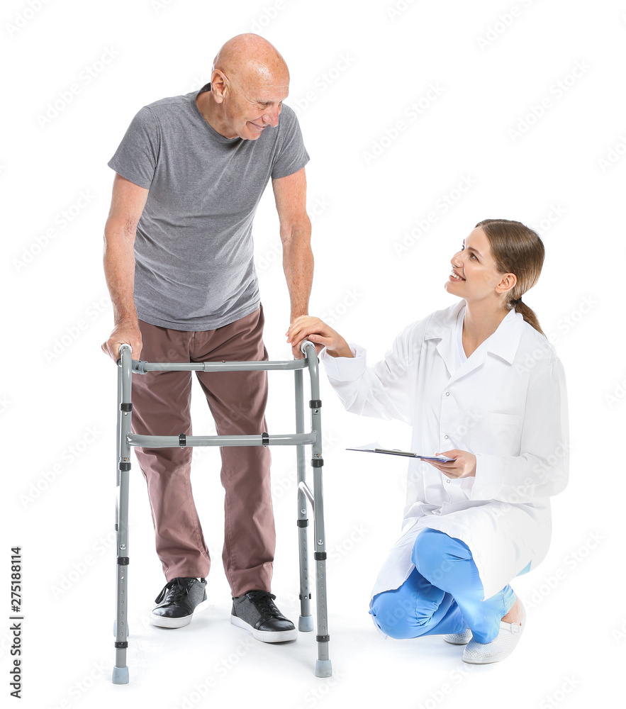 Elderly man with doctor on white background