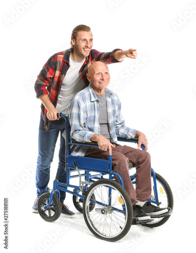 Handicapped elderly man with son on white background