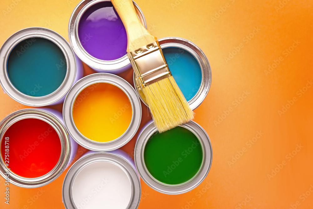 Cans of paints and brush on color background - obrazy, fototapety, plakaty 