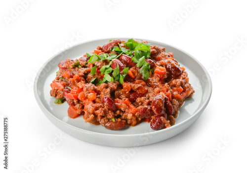 Plate with tasty chili con carne on white background