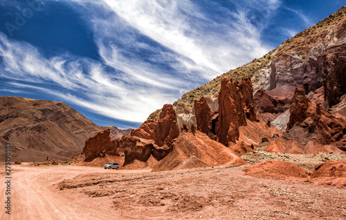 San Pedro de Atacama, Chile - January 18, 2016: The Arco Iris Valley is part of the tour options for those who visit the Atacama, with beautiful landscape with rocks and cliffs of varied coloration.