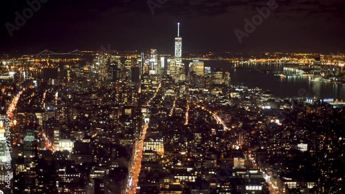 Wallpaper Mural Aerial view of tall skyscapers in Manhattan lit up at night. Torontodigital.ca