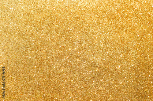 light of golden glitter texture background