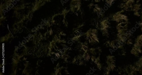 Drone flying forward and revealing with a pan up Cotopaxi volcano in the Ecuadorian highlands in Ecuador, South America