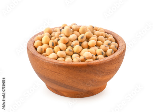 Soybeans in wooden bowl on white background.