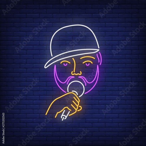 Man with beard and microphone neon sign