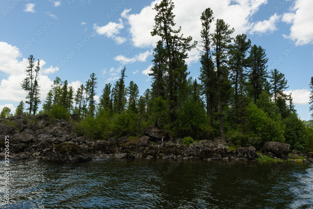 a trip along Teletskoye Lake on a motorboat in the Altai Mountains a trip along Teletskoye Lake on a motorboat in the Altai Mountains