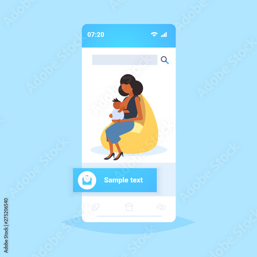 african american mother breastfeeding her newborn baby woman sitting on armchair motherhood nutrition lactation concept smartphone screen mobile application flat full length