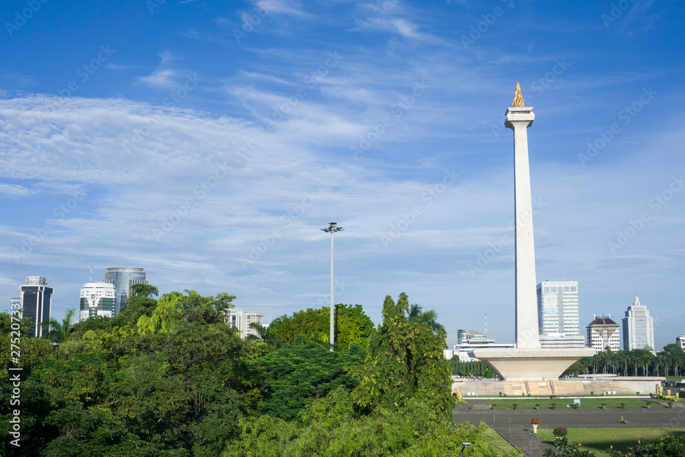 Jakarta city view from Gambir Station. Monas is landmark for Jakarta, Indonesia 