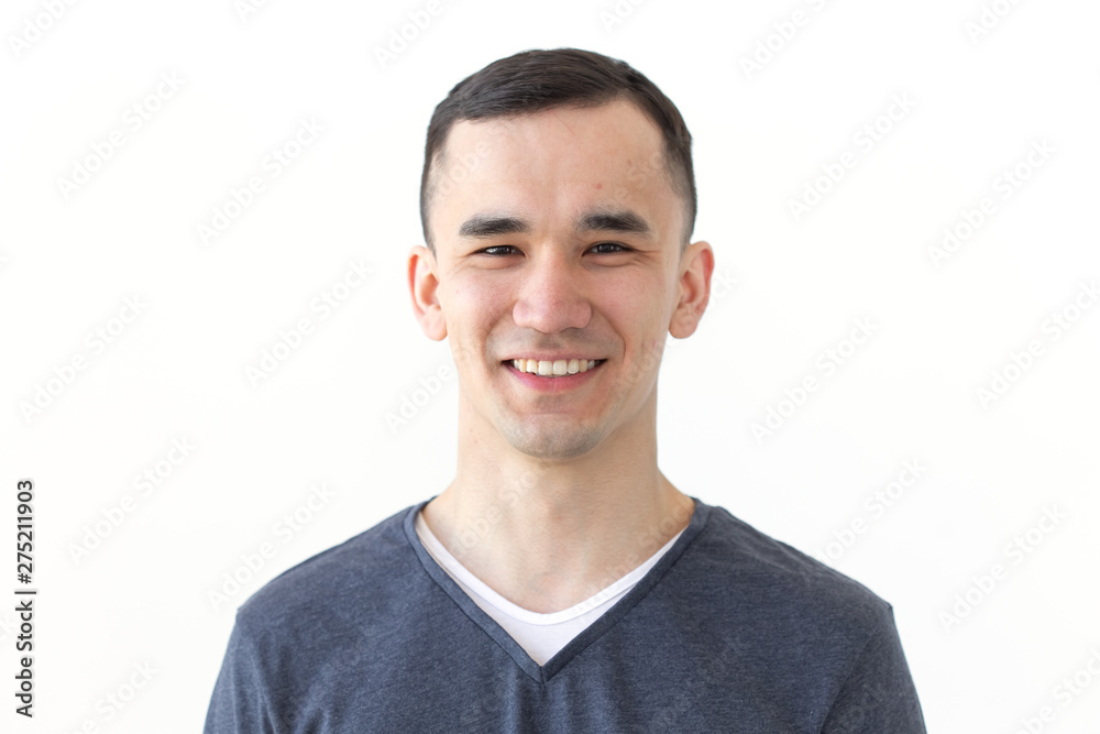 Expression and gesture concept - Close up portrait of smiling asian man Expression and gesture concept - Close up portrait of smiling asian man