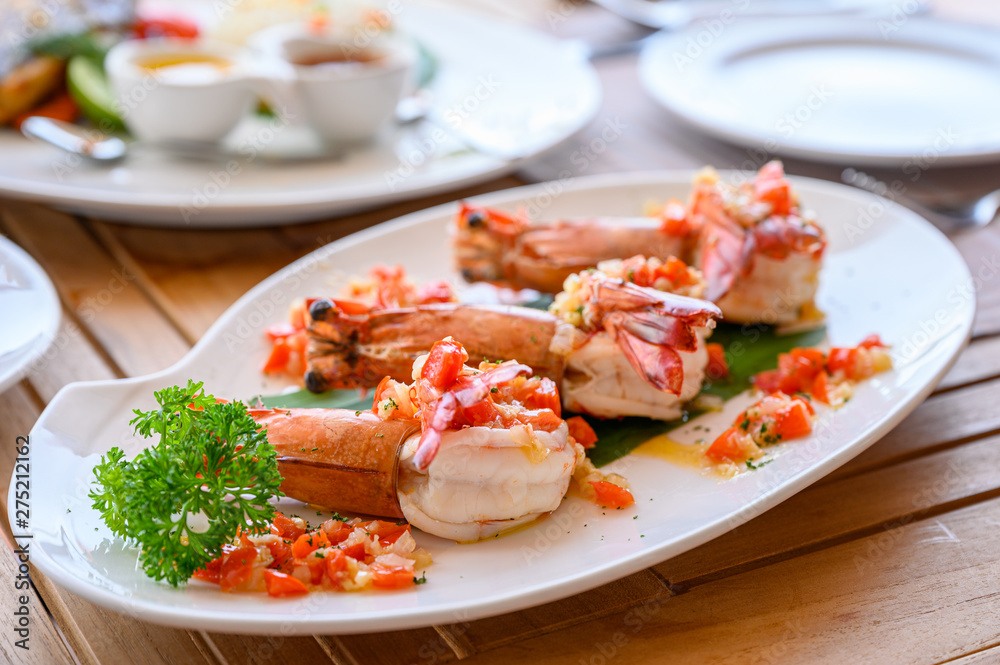 Spicy chili grilled prawns in white plate Spicy chili grilled prawns in white plate