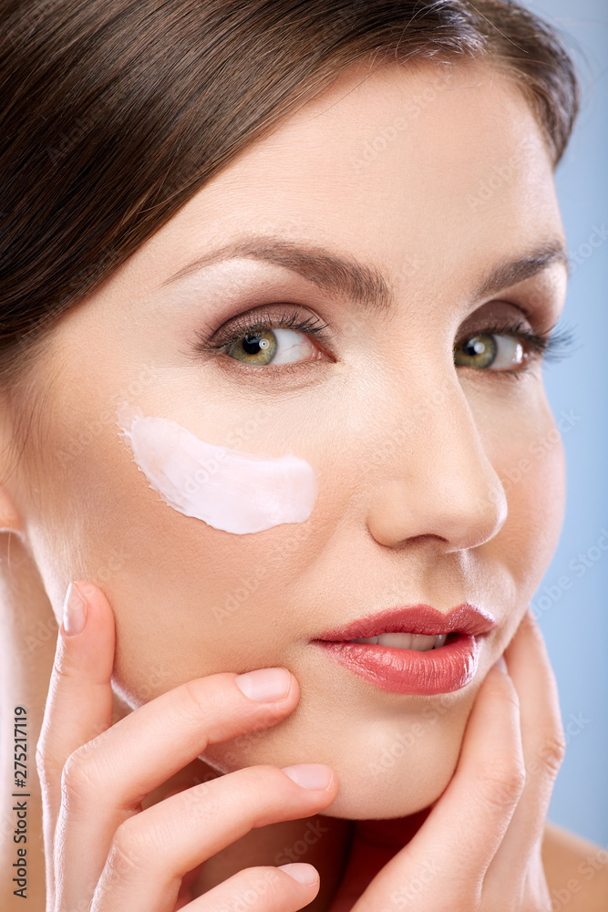 Facial portrait of woman with clean skin and cream for eyes. Facial portrait of woman with clean skin and cream for eyes.