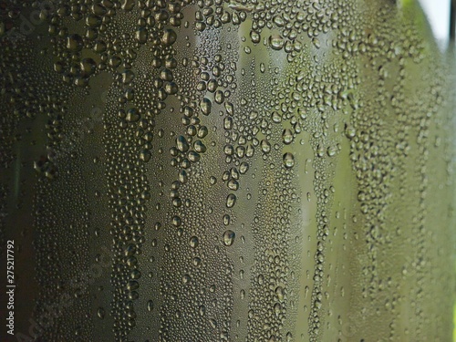 rain drops on water stainless tank