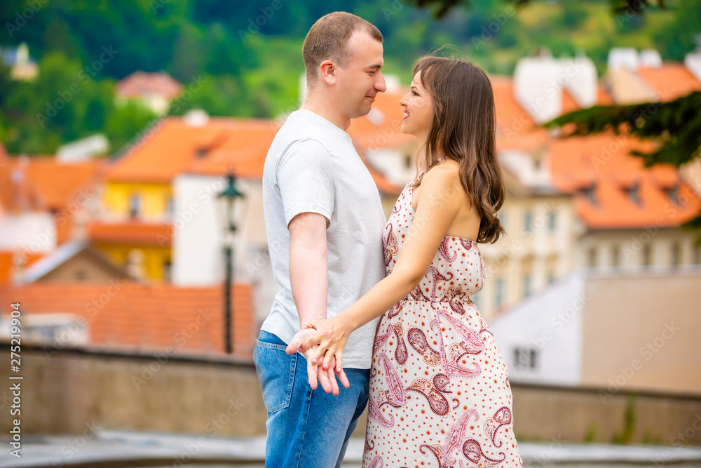 Young couple walking in old town of Prague Young couple walking in old town of Prague