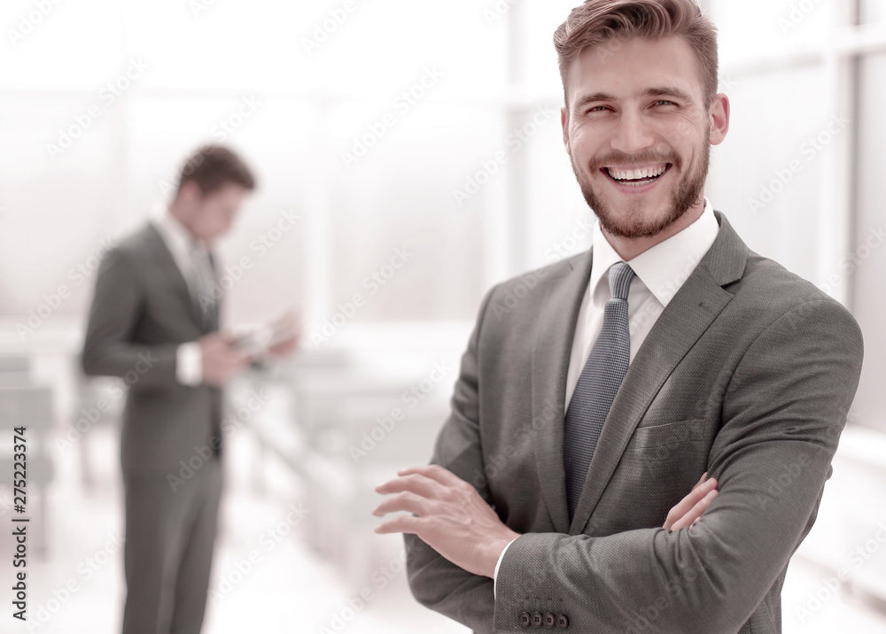 successful businessman on the background of the office successful businessman on the background of the office