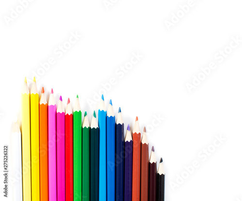 Colored pencils row isolated on white background.