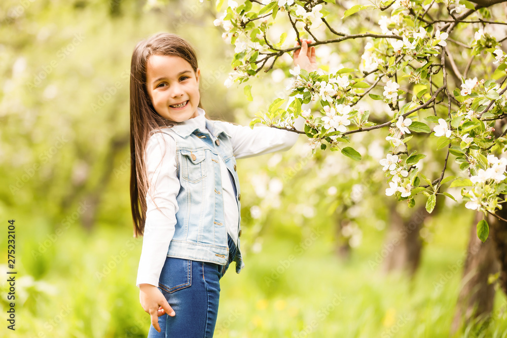 Portrait of smiling little girl in nature stock photo