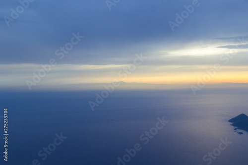 Wallpaper Mural The sea at sunset, the sky in pastel blue colors, blur. Torontodigital.ca