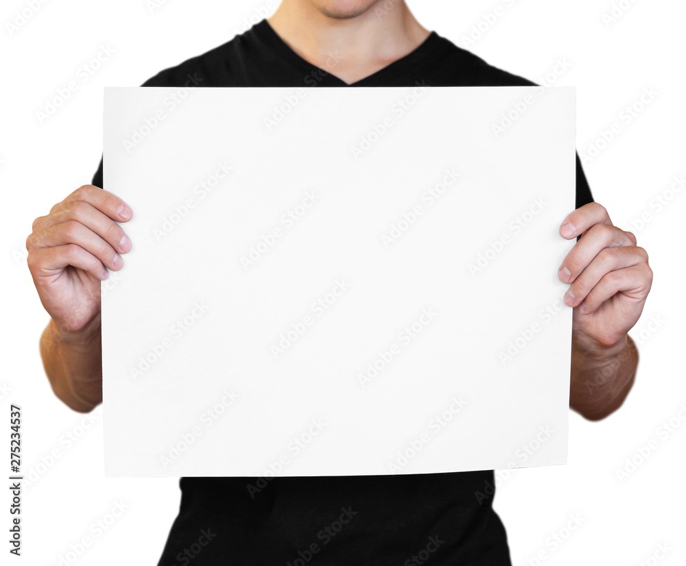 A man holding a white sheet of paper. Holding a booklet. Close up. Isolated on white background A man holding a white sheet of paper. Holding a booklet. Close up. Isolated on white background
