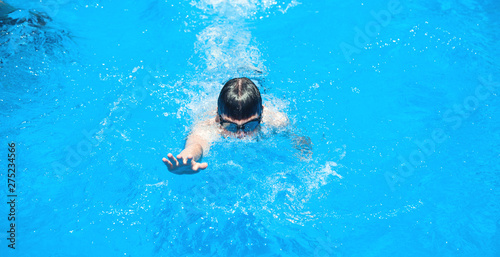 Caucasian man in the swimming pool.