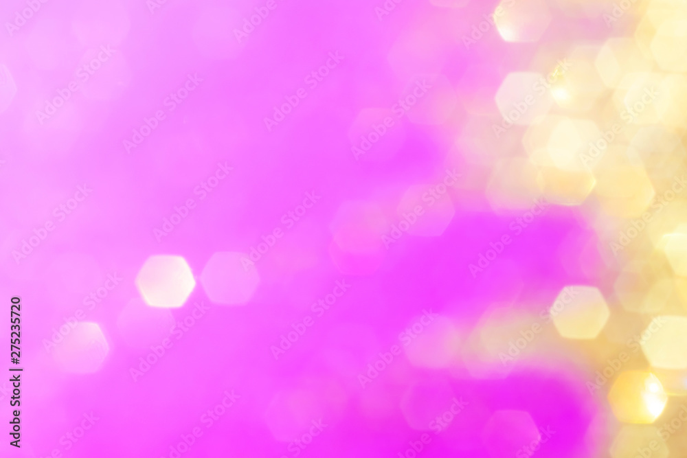 Blurred background - pink surface with gold sparkles. Abstract image. Bright color. Abstract circular bokeh. Blurred background - pink surface with gold sparkles. Abstract image. Bright color. Abstract circular bokeh.