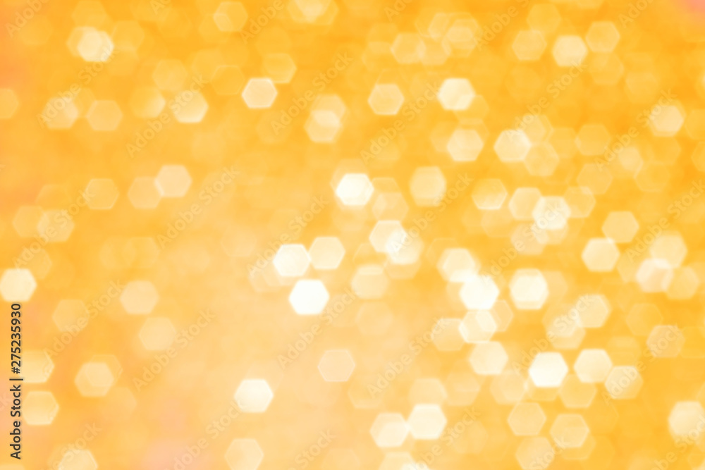 Blurred background - golden sparkles. Abstract image. Bright color. Abstract beautiful fasion bokeh. Blurred background - golden sparkles. Abstract image. Bright color. Abstract beautiful fasion bokeh.