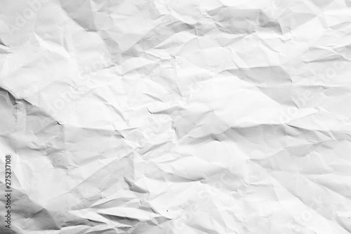 White crumpled paper abstract art background. Wrinkled texture effect. Copy space.