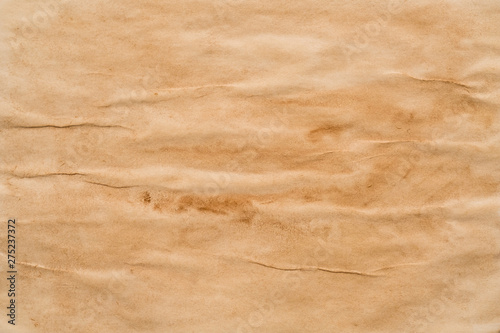 Brown acrylic paint abstract art background. Caramel cream design. Colored textured paper surface.