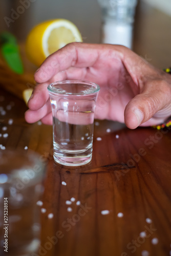 Fotografie Break out the shot glasses, salt and lemon, barman, it's shooter time