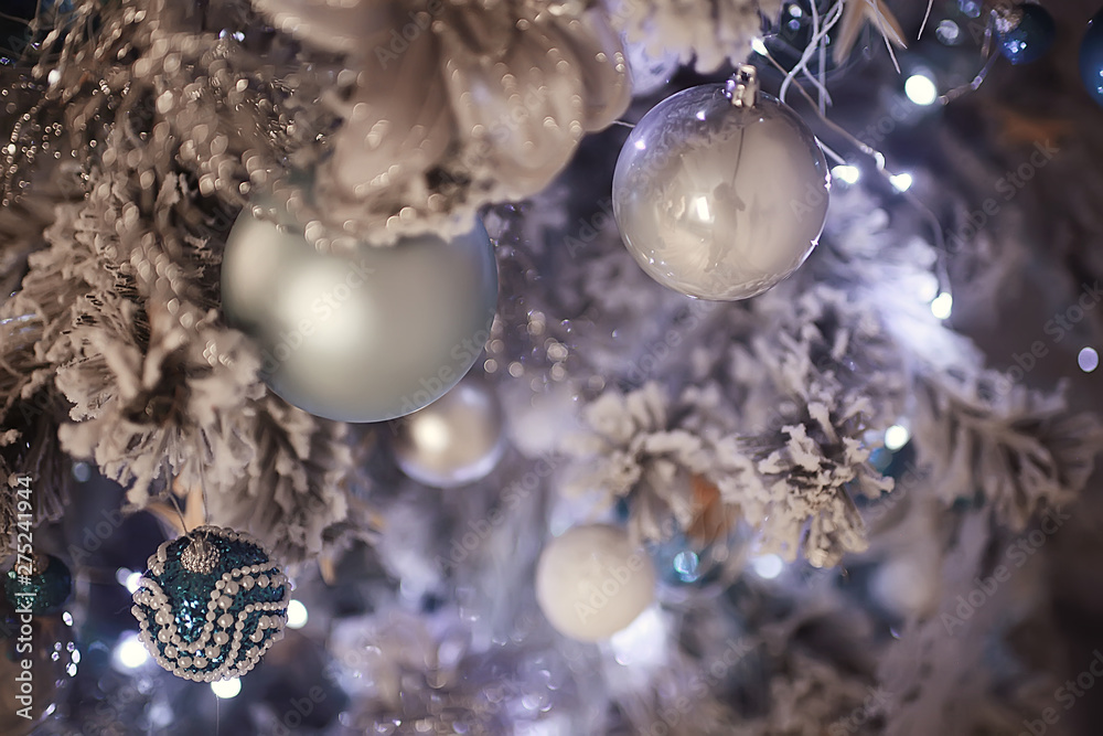 New Year Decoration Background / Blurred Beautiful Christmas Background, Toys On Decorated Christmas Fir New Year Decoration Background / Blurred Beautiful Christmas Background, Toys On Decorated Christmas Fir