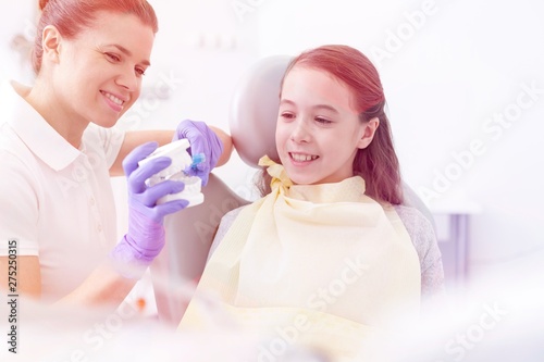 Medical personel  doctors  nurses and dentists  during different procedures with patients.