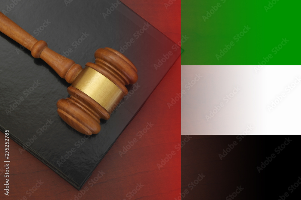 United Arab Emirates legal and law concept, judge gavel with book on table and uae flag collage 