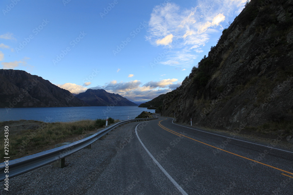 calmly on the road in morning with mountain and blue sky background in newzealand