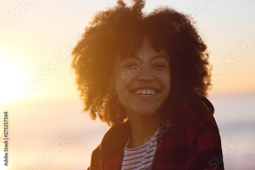 Smiling portrait of a real mixed race woman