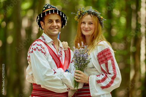 Man and woman in traditional costumes