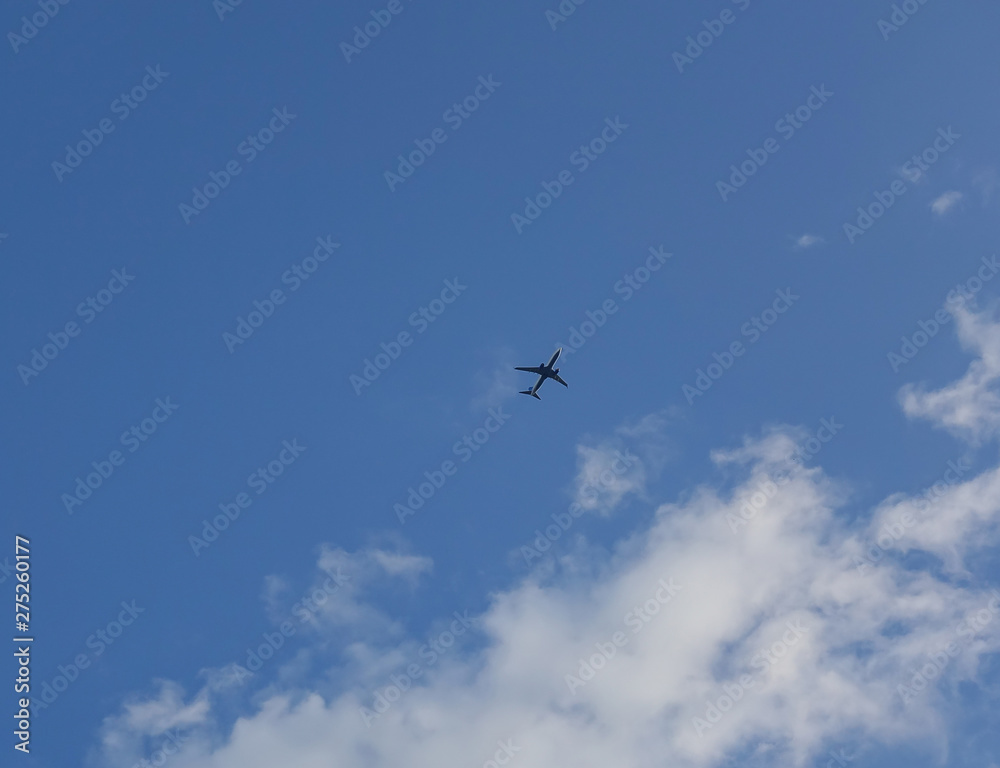 plane flying in a cloud sky and cleared plane flying in a cloud sky and cleared