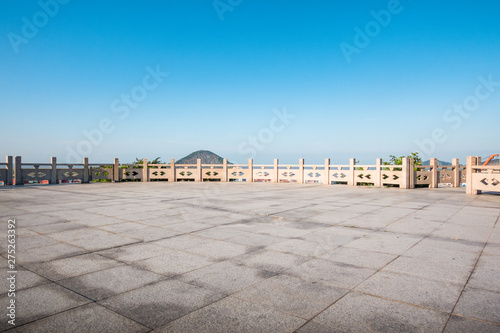 white wooden table top with the mountain landscape