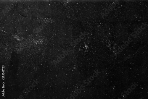 Photographie white dust and scratches on a black background