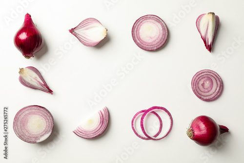 Flat lay composition with red onion on white background