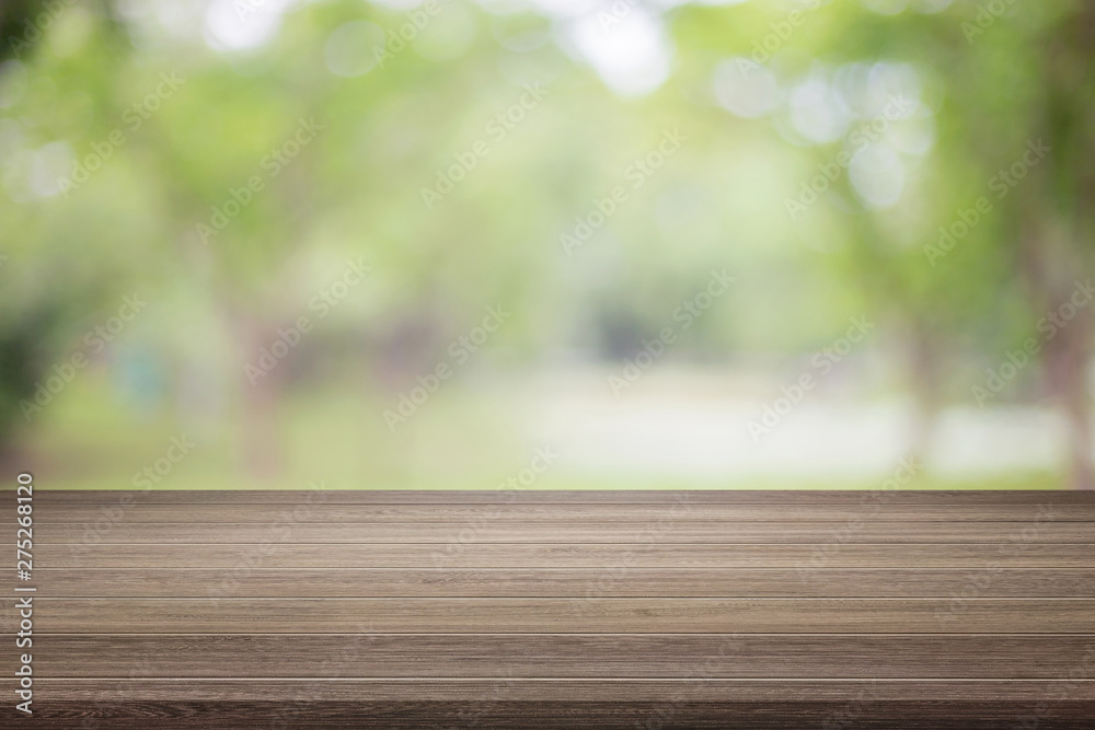Empty wooden table with blurred green background with a country outdoor theme,Template mock up for display of product Empty wooden table with blurred green background with a country outdoor theme,Template mock up for display of product