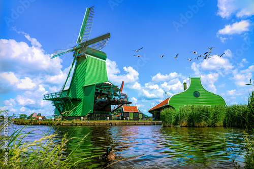 The famous Zaanse Schans mills in Zaandam, on the Zaan river. Famous holland attraction, windmills. photo