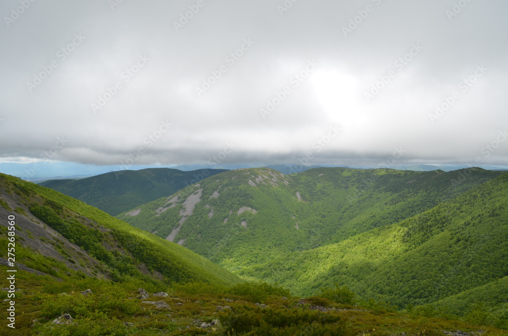 Fototapeta premium landscape with mountains and clouds