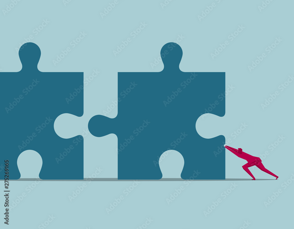 Businessman pushes puzzle symbol. The background is blue.