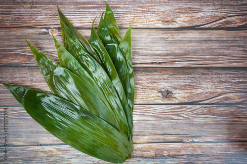 The ingredients of zongzi in the background of wood grain