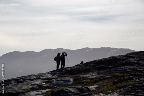 Silhouette of two hikers