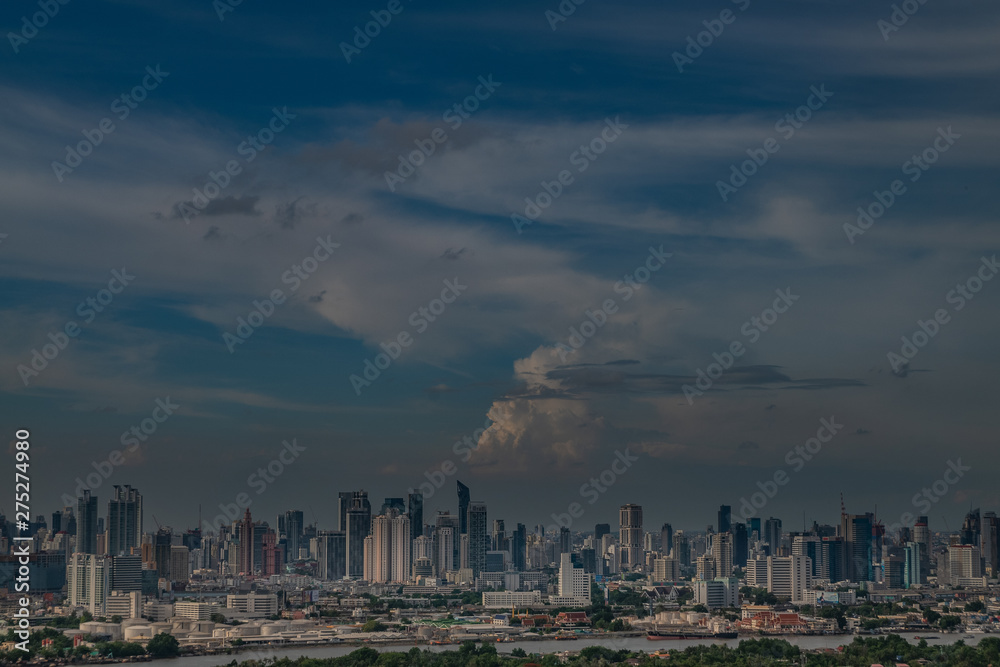 Fototapeta premium Sky view of Bangkok evening view with skyscraper in the business district in Bangkok, Thailand. City View Urban Downtown Business District Concept.