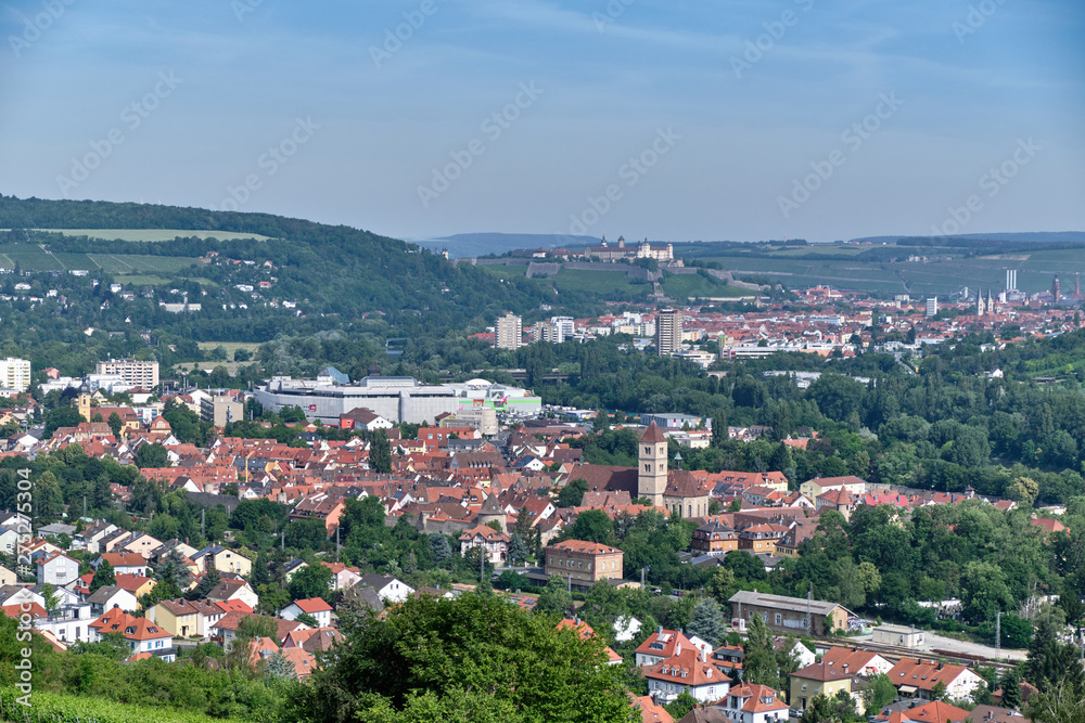 Beautiful scenic view from nearby the Rasthaus Würzburg Nord over the city of Würzburg with the Fortress Marienberg in the middle of the background