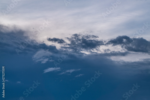 Blue sky and cloud, Sky on a bright day. The softness of the clouds and the brightness of the sky. Light blue background.Bright blue background. Relaxing feeling and inspirational.